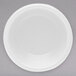 A white Elite Global Solutions melamine ramekin on a white plate.