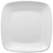 A close-up of a white Elite Global Solutions square plate with rounded edges and a white rim.