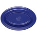 An oval purple melamine platter with a silver logo on it.