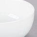 A close up of a 10 Strawberry Street Royal Coupe white porcelain soup bowl with a white rim.