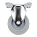 A silver metal Cambro 3" rear fixed caster wheel with a rubber wheel and white plastic base.