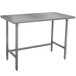 A silver rectangular Advance Tabco stainless steel work table with legs.