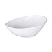 An Elite Global Solutions white melamine oblong bowl with a curved edge.
