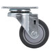 A black metal and rubber swivel caster for service carts and Camdollies.
