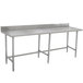 An Advance Tabco stainless steel work table with a backsplash and open base.