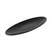 An Elite Global Solutions black oval salmon platter with curved edges.