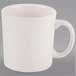 A white Homer Laughlin mug with a handle.