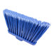 A blue Carlisle broom head with white bristles.