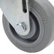 A grey Cambro swivel caster wheel with a metal bracket.