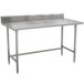 A stainless steel Advance Tabco work table with a backsplash.