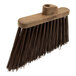 A brown Carlisle Duo-Sweep broom head with unflagged bristles.
