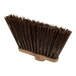 A Carlisle Duo-Sweep broom head with brown unflagged bristles.