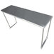 A long silver stainless steel table mounted overshelf.