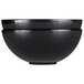 An Elite Global Solutions black triangular melamine bowl.