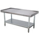 An Advance Tabco stainless steel equipment stand with a shelf.