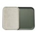 A green Cambro cafeteria tray with a white parchment insert.