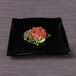 An Elite Global Solutions black rectangular wave platter with sushi on it.