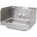 An Advance Tabco stainless steel hand sink with two holes in the back.