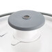 A white and grey plastic lid for a Robot Coupe food processor.