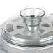 A close up of a clear glass lid on a Robot Coupe bowl.