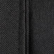 A close up of a black fabric with a zipper.