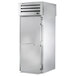 A stainless steel True Spec Series roll-through refrigerator with a solid door.
