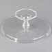 A clear plastic Fineline cake stand with a hexagonal base.