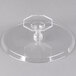 A clear plastic two-piece cake stand with a clear plastic base and a clear plastic top with a hexagon design.
