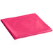 A hot magenta pink plastic table cover with a white background