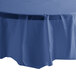 A navy blue Creative Converting OctyRound tablecloth on a table.