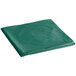 A folded hunter green plastic table cover on a white background.