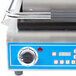 A Globe GPG14D Deluxe Sandwich Grill with grooved plates on a counter in a professional kitchen.