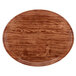A wooden oval tray with a java teak design and white rim.