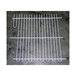 A white wire grid divider for a True back bar refrigerator.