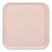 A square light pink Cambro tray.