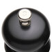 A Chef Specialties Salem Ebony salt mill with a silver top and knob.