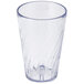 A clear plastic tumbler with a wavy design.