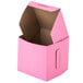 A pink 4" x 4" x 4" cupcake box with a lid.