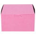 A pink box with a lid.