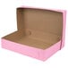 A Baker's Mark pink half sheet cake box with the lid open.