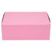 A pink rectangular Baker's Mark cake box with a white border.