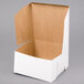 A white bakery box with a lid.
