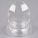 A clear plastic egg shaped lid with a round base.