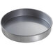 A Chicago Metallic aluminized steel round cake pan with round bottom.