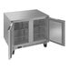 A stainless steel Beverage-Air undercounter freezer with two doors open.