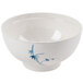 A white bowl with blue bamboo designs on the side.
