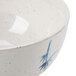A white melamine bowl with blue bamboo design on the lid.