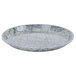 A round gray Cambro tray with black swirls on it.