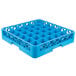 A blue plastic Carlisle glass rack with a grid of holes.