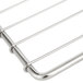 A stainless steel wire oven rack with a handle.